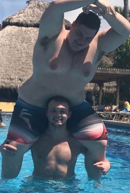 Damn This Guy Must Be Strong As Hell To Be Able To Hold Such A Big Man On His Shoulders. That Dude Probably