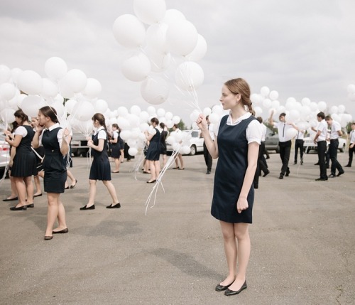 global-musings: An Ossetian graduate from the town of Beslan prepares to release balloons in honor 