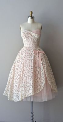 loopylass55:  shewhoworshipscarlin:  Party dress, 1950s.   @inanna76 💕