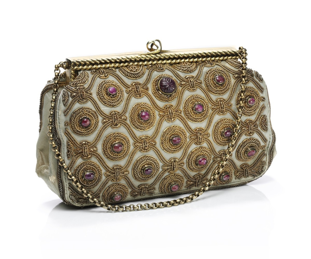theladyintweed:  A handbag with embroidered silver gilt and carved rubies by Van