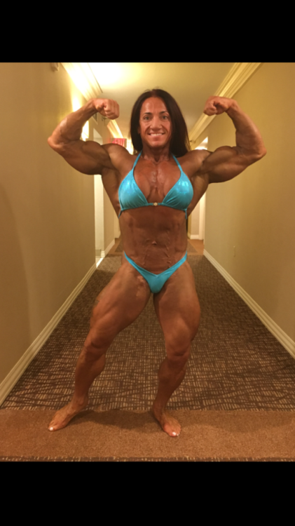 Anne Sheehan and her enormous size in all its front double biceps glory!!!