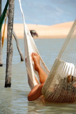 bareattitude:  The best of everything. A hammock at high tide. An awesome way to be lazy and enjoy the sun. 