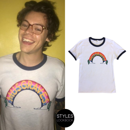styleslookbook: Harry was pictured wearing a Kacey Musgraves rainbow ringer tee. The t-shirt feature