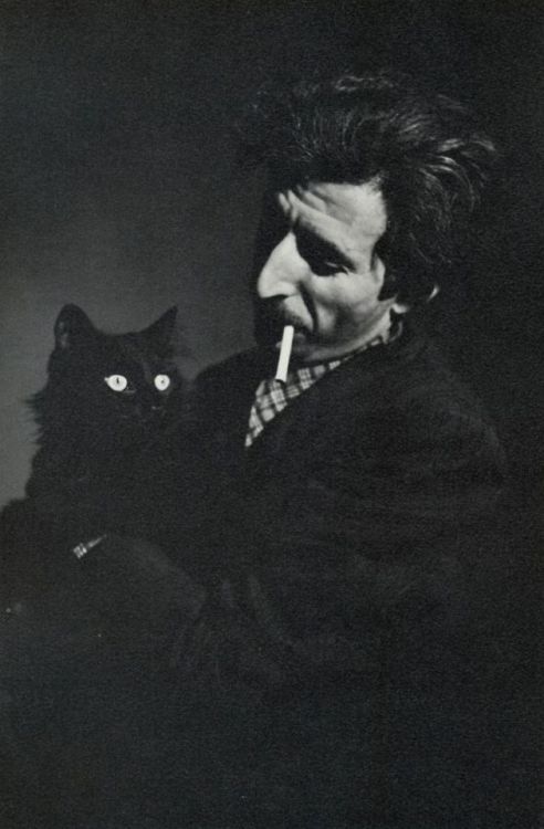 by Gjon Mili (1904-1984)with his cat Blackie