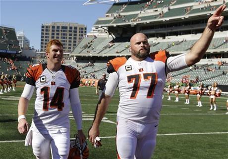 notdbd:  Andrew Whitworth is the big bald beautiful bare-assed player in the Cincinnati Bengals locker room. He played college football at LSU. His dark-haired naked teammate is Tyler Eifert. 