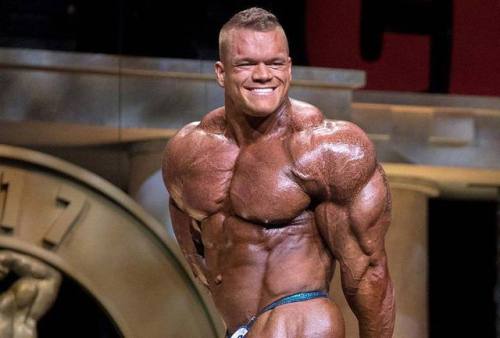 Dallas McCarver posing in a contest