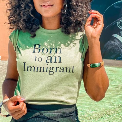 “Born to an Immigrant”  @shopblatina @nickysaysyolo rockin’ a size small in our unisex “Born to an I