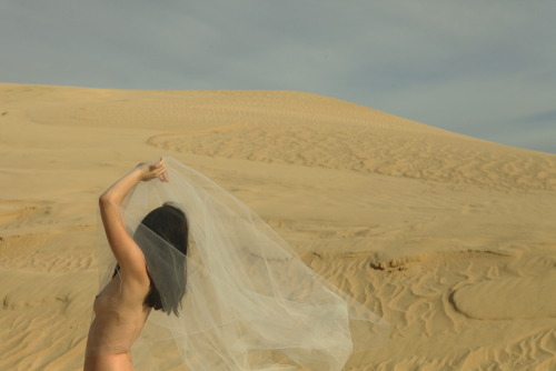rebeccadimovski:  Enigma. I’ve started noticing two opposites attracting in my works as of recent. The delicate yet graciously constricted female form dancing with how simple and untouched our sacred land is. What i’m essentially doing is forming