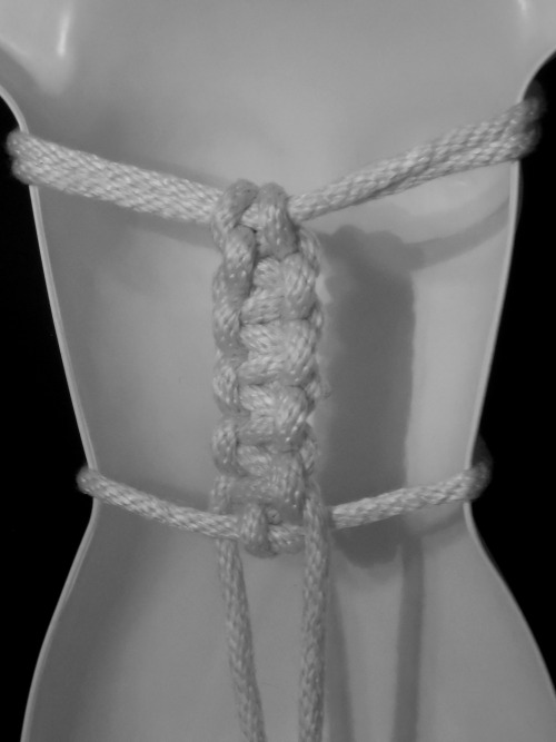 asubmissiveintraining:  ropebondagebyahab:  Dragonfly Harness Dragonfly Harness. Original design by me. Multiple loops on the chest for tie-offs or suspension work. Braided panel on the back for comfort and support during extended face-up suspension.