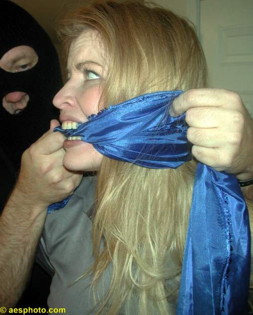 graybandanna:  Sadie Belle getting cleave gagged (and apparently not too happy about it)