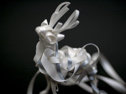 ktt: White Stag by Baku Maeda Self-standing stag figure woven and composed entirely with ribbon
