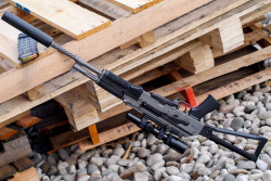 bolt-carrier-assembly:  30roundrevolution:  dirty-gunz:  9x33mmr:  manlythings:  It’s odd to see an AK with a suppressor, still stranger to see one with a variable optic. Very neat gun.  can someone explain when it became ok to mount a scope like this?
