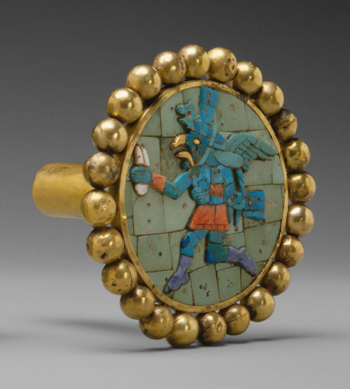 Title:Pair Of Ear Ornaments With Winged Runners