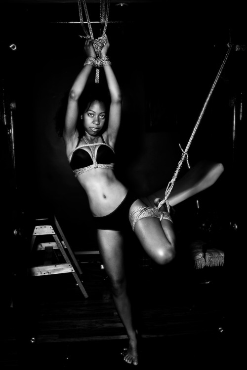 stark-arts:  stark-arts:  skinny ebony model in rope and partial suspension  never sure what will ma