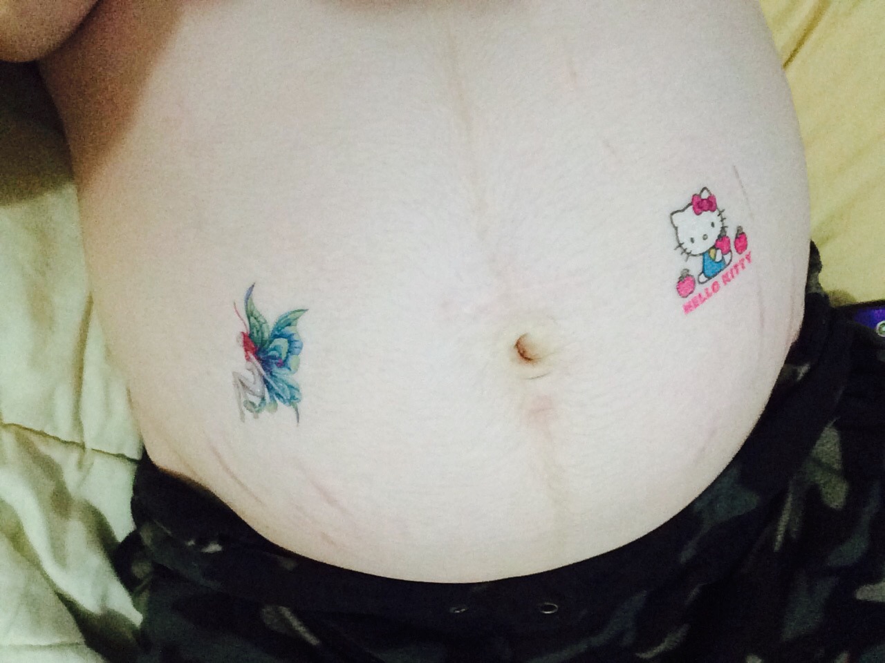 daddysbabydollxx:  Temporary tattoos on my belly 