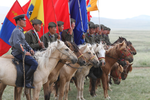 brassers:titovka-and-bergmutzen:Mongolian cavalrymen put on a demonstration of horseback skill durin