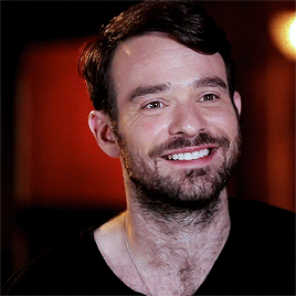 charliecoxcentral:One of the things I do as human a lot is smile.