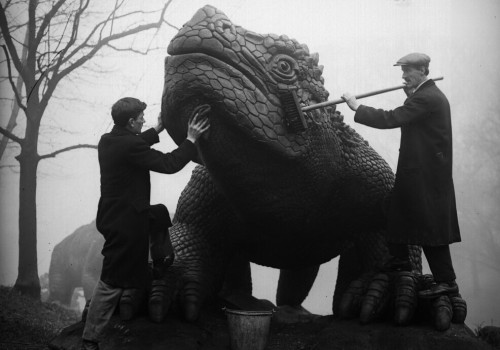 Cleaning of the Crystal Palace Dinosaurs (1930).Two dinosaur models (a hylaeosaurus and ichthyosauru