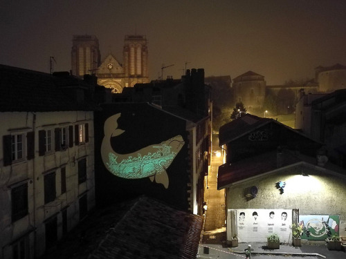 itscolossal:When the Sun Sets in Baiona, a Seemingly Simple Whale Mural Reveals a Belly Full of Sail