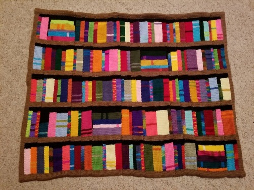 teashopcrafts: It’s done!  One Bookshelf Blanket, which my dog apparently has decided shall belong t