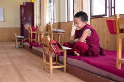 rucking-fad:  humansofnewyork:  I walked into a classroom where some young Tibetan students were practicing their chants, and all the kids suddenly grew very focused and well-behaved on account of the visitor. Except for this guy, who started laughing