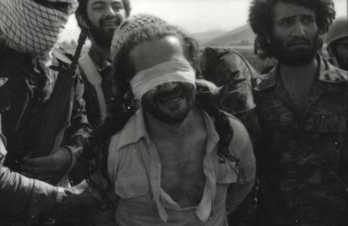 chasing-rose:  The Pulitzer Prize winner photographs, Iranian revolutionary guards executing Kurds. The 11 men were executed on august 27, 1979 at the Sanadaj Airport. (Last Photograph) Among the 11 people executed at Sanandaj Airport was this injured