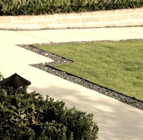Front Yard - Contemporary LandscapeInspiration For A Mid-sized Contemporary Partial Sun Front Yard Gravel