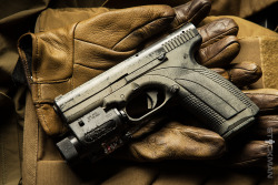 gunsknivesgear:  Caracal F, a 9mm pistol