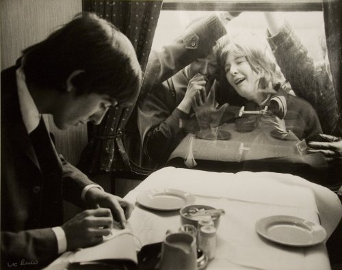 vintageeveryday:George Harrison writing autographs for fans. London, 1964.