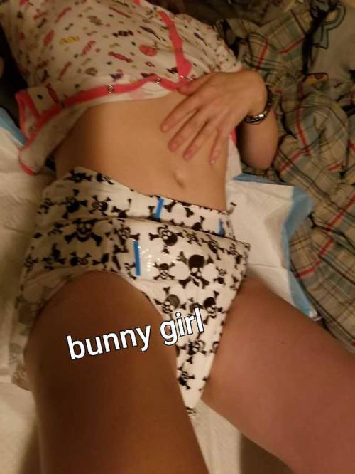 Panda boy diapered up bunny girl in cute skull diapers, but not before putting in a catheter . The d