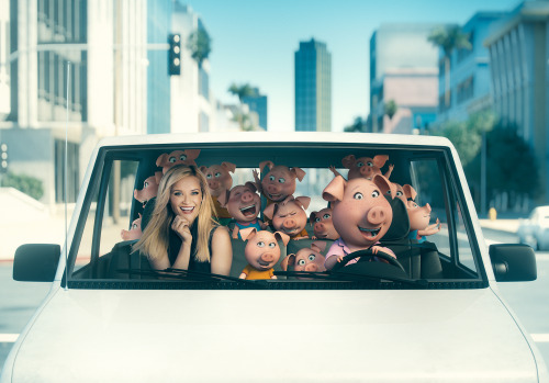 singmovie:Reese Witherspoon carpools with her character, Rosita, and her piglets.