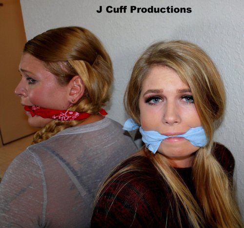 Back to back lovely captives bound and gagged
