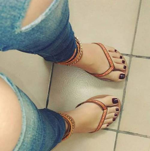 Beautiful sandals on beautiful feet.