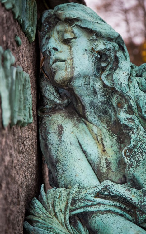 sixpenceee: Merello/Volta Monument: This 8 foot tall bronze sculpture is a depiction of a grief stricken young woman in her wedding dress. She is clutching a bouquet of flowers and appears to have fallen on the church’s steps. Time and weather have