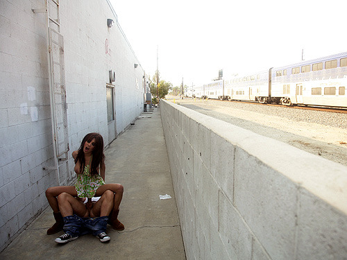 The “other side of the tracks (train tracks)” is supposedly the place of town where all the whores, porn shops and dance clubs are located. In other words, where all the fun goes down!!This horny perverse couple is sure enjoying “the other side