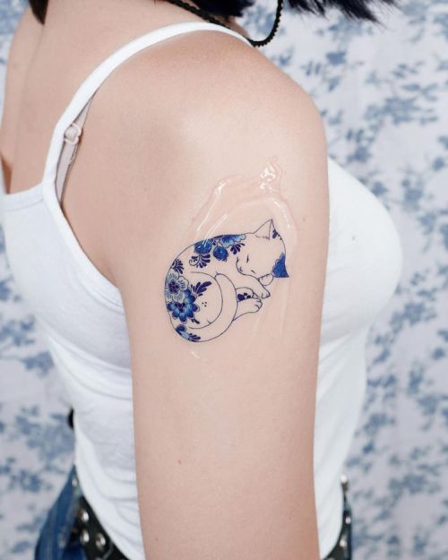 ig: e.nal.tattoo blue;cat;flower;outline