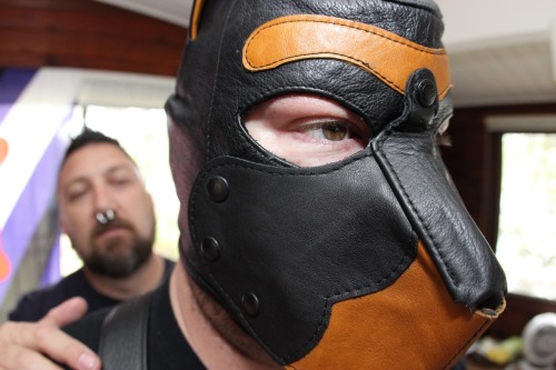 My bro Pup Trooper Bravo in his custom pup hood…That’s Sir in the background getting him ready for the training during the Pup Pride Downunder 2015 :)