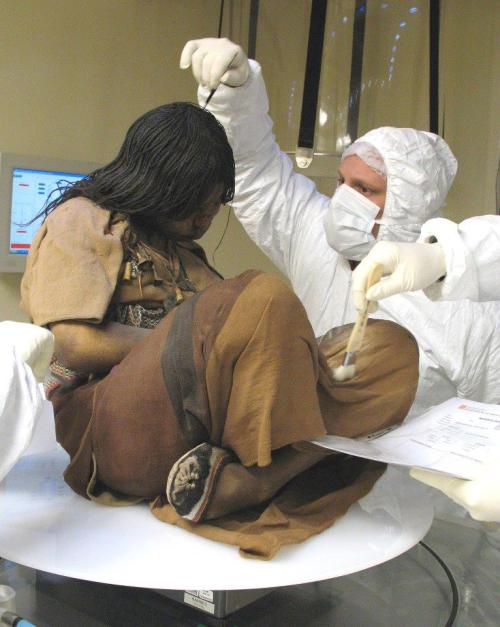 sweetlike-cinamen:      cheyennecc:  raspuma:           Scientists examine a 15-year-old girl who lived in the Inca Empire, then was sacrificed and remained frozen for 500 years….Unearthed in 1999 from the 22,000-foot summit of Mount Llullaillaco,