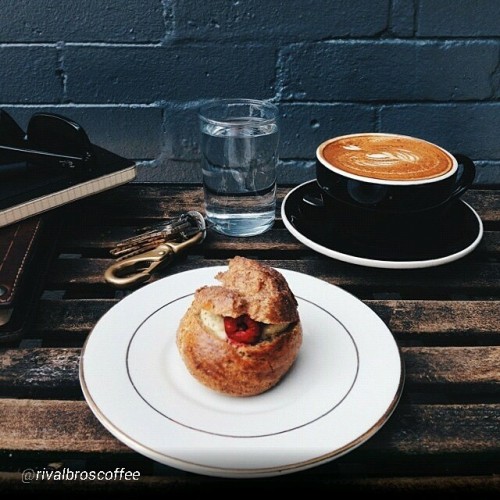 #Colorful my #morning #coffee 👀  By @rivalbroscoffee “a.m. snapshot // rye pistachio cream puff with raspberries, latest creation from @highstphilly’s @sekincaid85 #vscocam #philly #fitlersquare #coffee”