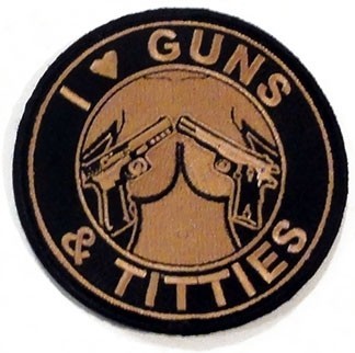 tacticalshit:  Who loves guns and tits?!?! Everyone does.  Order your shit HERE. 