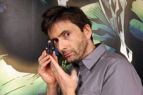 tennydr10confidential: David Tennant being adorkably playful posing with toys.