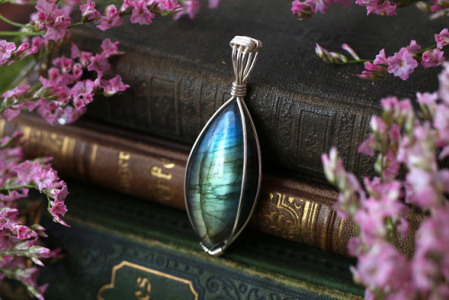 All these beautiful wire wrapped sterling silver labradorite pendants are available at my Etsy Shop 