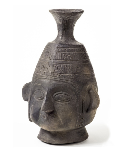 Jar with depiction of human face chewing coca, Chimu/Inca, Peru, 1100–1470. Clay, incised. American 