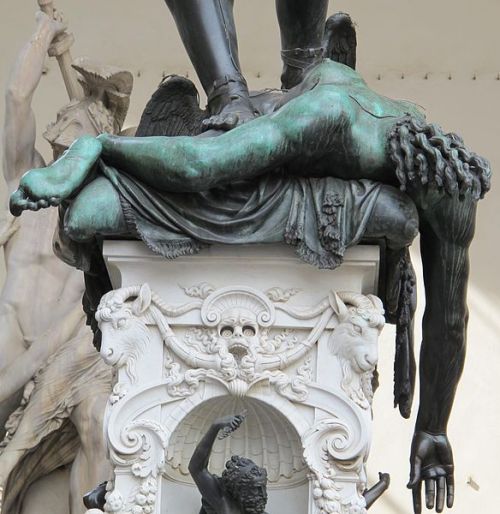 f-l-e-u-r-d-e-l-y-s:  Perseus with the Head of Medusa: Benvenuto Cellini -1554  Sculpture 3.20 m  on a square base with bronze relief panels is located in the Loggia dei Lanzi of the Piazza della Signoria in Florence, Italy. The subject matter of the