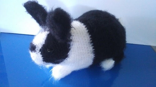 This is a crocheted messenger bunny commissioned by an awesome Magicians fan as part of the Magician