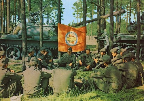 partisan1943:  East German soldiers on a break from a military exercise.