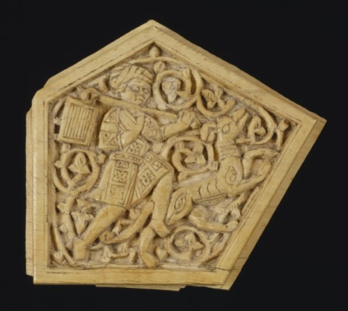 Man and his dogFatimid Egypt, 11th-12th centuryThis ivory pentagonal plaque depicts a running man an