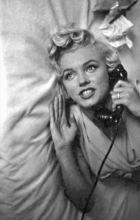When you browse informal photos of Marilyn Monroe, there are three recurring themes: she’s often in 