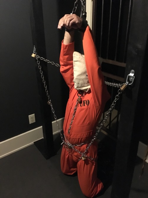 seabondagesadist:  The prisoner came to visit for some heavy bondage and captivity. After processing he found himself in orange, tape gagged, muzzled, shackled, mittens, chained and strapped in heavy bondage for several hours… 