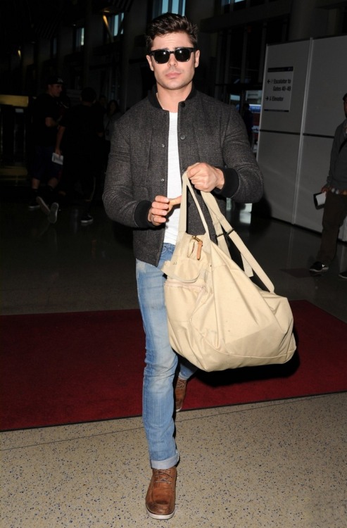 Zac was spotted through the airport LAX in Los Angeles March 7, 2014, while he was taking a flight t